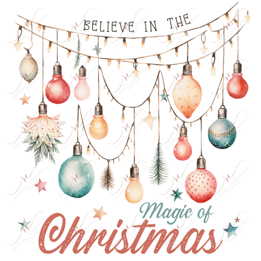 Strings of white Christmas lights with gold, pink, red, green and blue ornaments hanging from them.