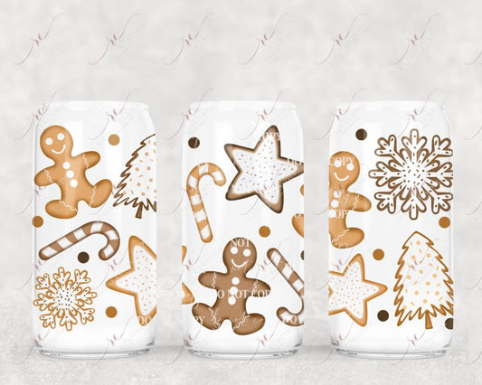 Christmas cookies in the shape of a candy cane, gingerbread man, star & christmas treee