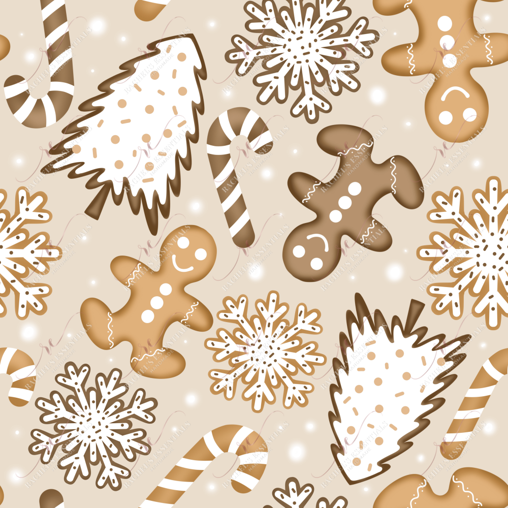 Christmas cookies in the shape of a gingerbread man, snowflake, candy cane & Christmas tree.