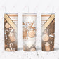 tumbler design featuring a boho, neutral color theme Christmas scene. Candy canes, reindeer, ornaments, marshmallows, hot chocolate, santa hats and snowflakes are scattered throughout the design. A bleach effect is on the front of the design with the words Merry Merry Christmas.  