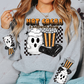 Model wearing a grey crewneck sweatshirt. 2 designs on each sleeve featuring a white ghost mug with whip cream, a spider blanket, and a black and orange bucket with popcorn. The same image is on the center of the sweatshirt with the words hot cocoa and halloween movies written at the top. A spider is dangling down from the words in his web